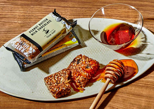 plate of honey and peanut butter milk chocolate oat bars 